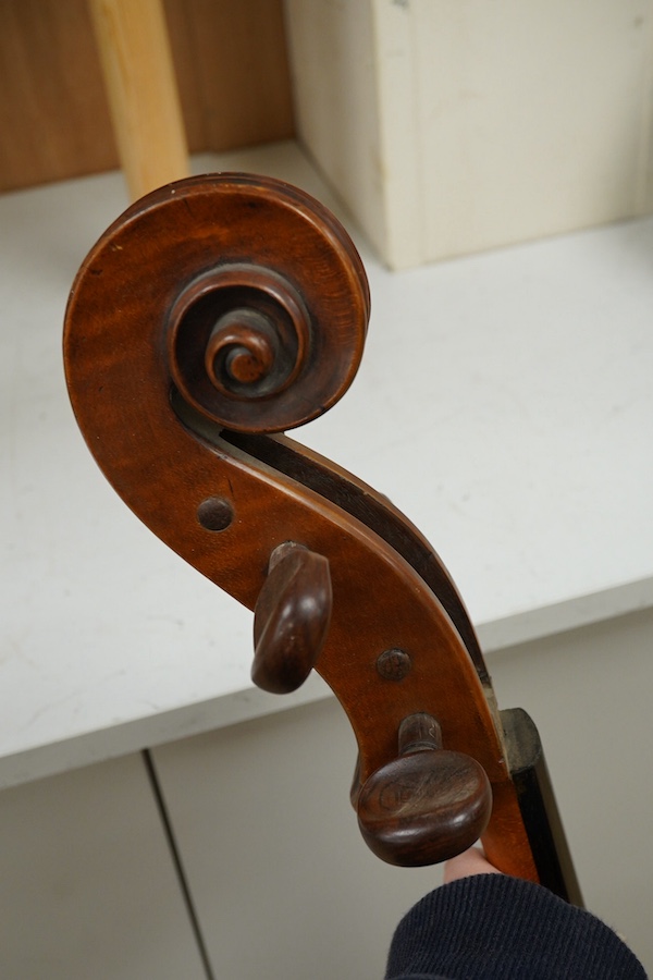 An early 19th century English cello for restoration, body length 74.5cm, together with an ebonised wood W.E. Hill & Sons case. Condition - poor to fair.